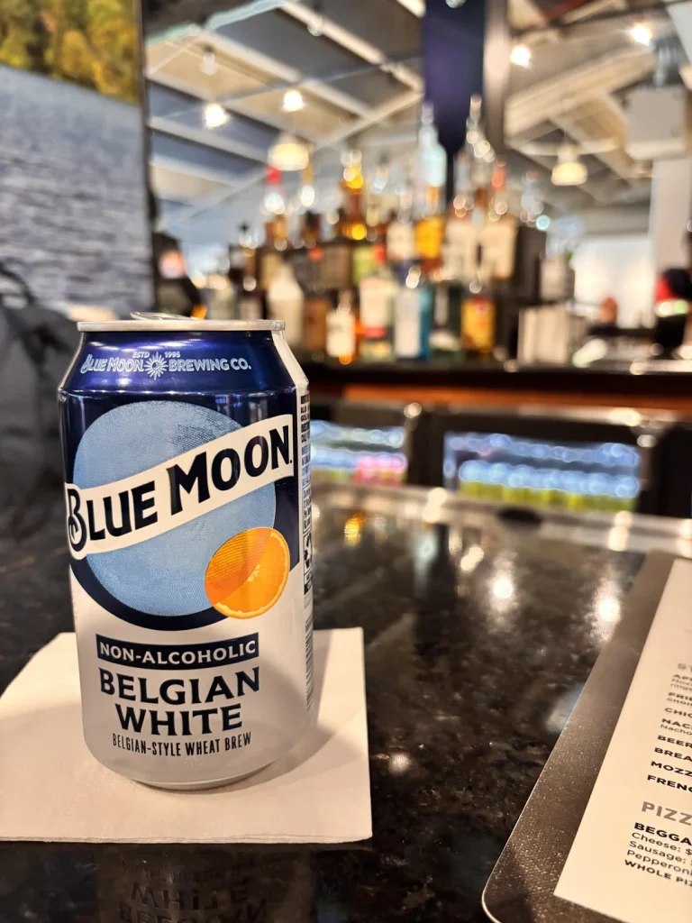 Can of Blue Moon Non-Alcoholic Beer sitting on the bar at Leinenkugel Lounge at Rate Field in Chicago